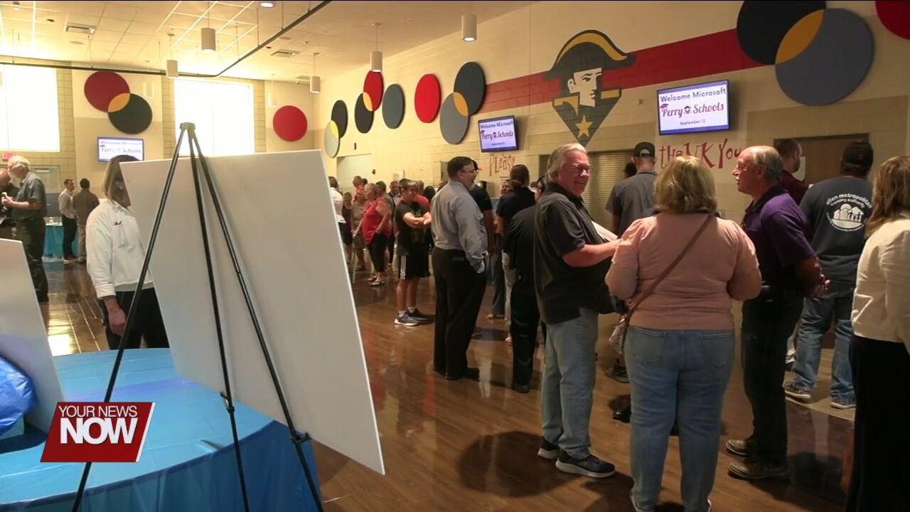 Microsoft employees talk one-on-one with Perry Township residents about potential data center